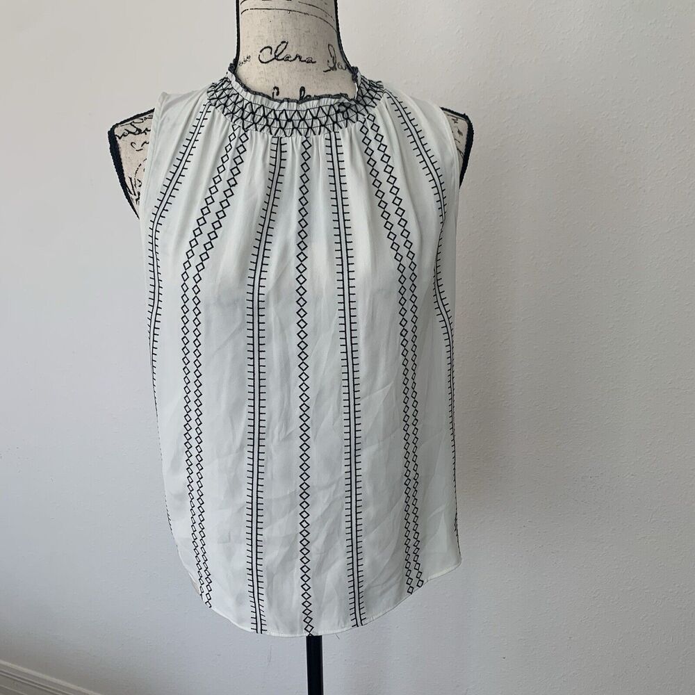 Womens White House black market pullover white blouse with Aztec design Size S